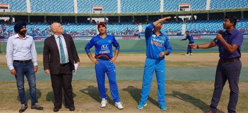 Image result for dhoni toss photo india vs afghanistan