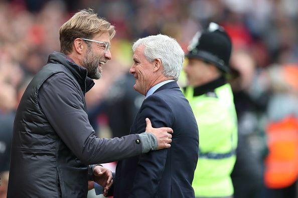  Liverpool FC v Southampton FC - Klopp and Hughes embrace warmly ahead of their Premier League meeting