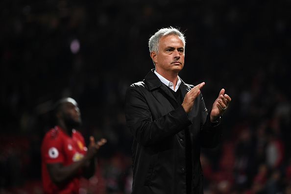 Mourinho applauds the Manchester United fans at the Stretford End