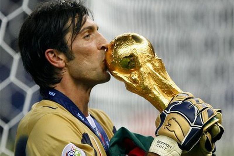 Buffon kisses the FIFA World Cup Trophy after Italy&#039;s win in 2006. (Image: Vox)