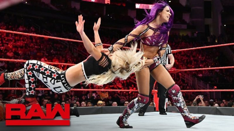 Image result for sasha banks and bayley vs riott squad