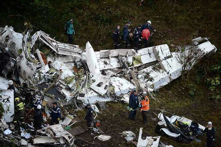 Rescuers search for survivors from the wreckage