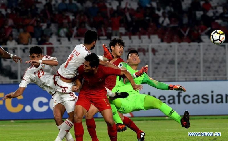 Breathtaking end-to-end action in the final minutes between Qatar and Indonesia (Image Courtesy: Xinhuanet)