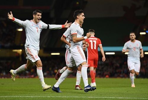 Spain players celebrate during a dominant display against Wales