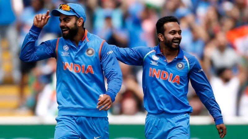 Kohli and Jadhav celebrating after a fall of