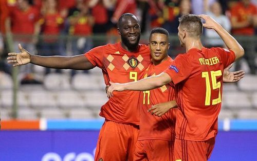 Romelu Lukaku celebrates with Youri Tielemans and Thomas Meunier after scoring the opener.