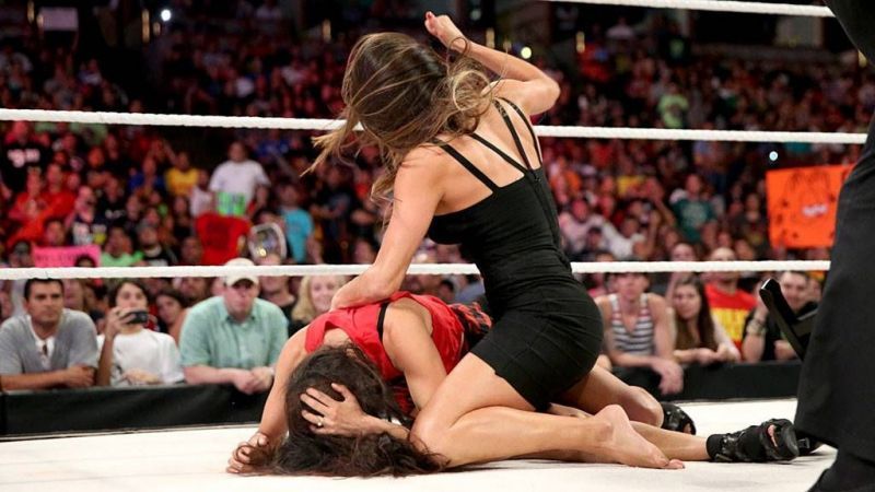 The Bella Twins fall apart allowing Ronda Rousey to win