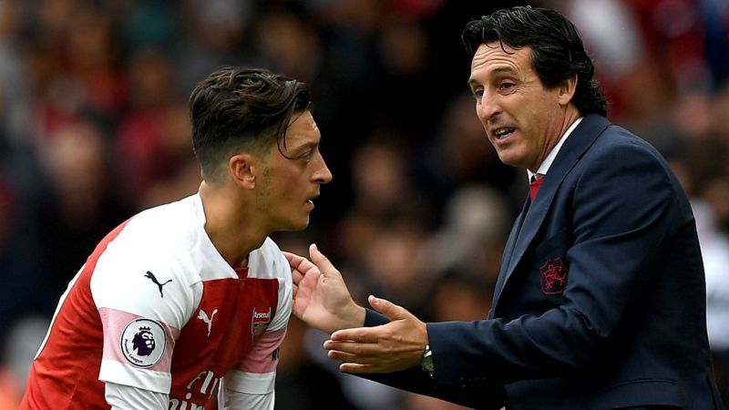 Emery with Mesut Ozil