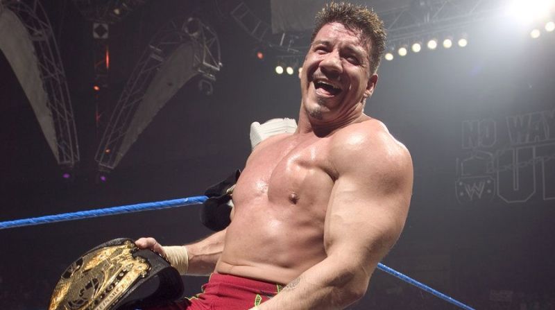 Eddie Guerrero celebrates with the WWE Championship