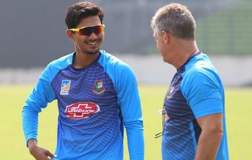 Fazle Mahmud Rabbi while chatting with Tigers' head coach Steve Rhodes ahead of the practice session at Mirpur on Monday