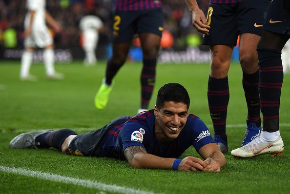 Barcelona striker Luis Su&Atilde;&iexcl;rez&#039;s hat-trick overwhelmed Real Madrid on Sunday