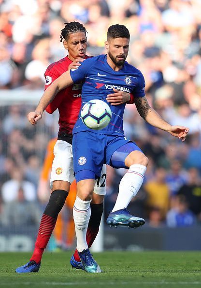 Chelsea FC v Manchester United - Premier League - Giroud using his strength against Smalling
