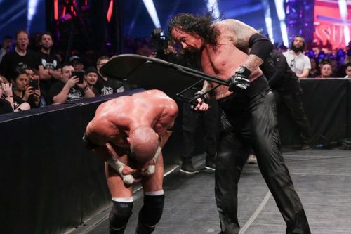 The Undertaker & Triple H faced off in a no disqualification match in the main event of Super Showdown.