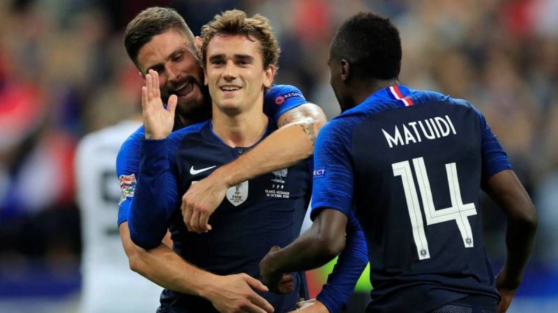 Griezmann celebrates after scoring from the spot