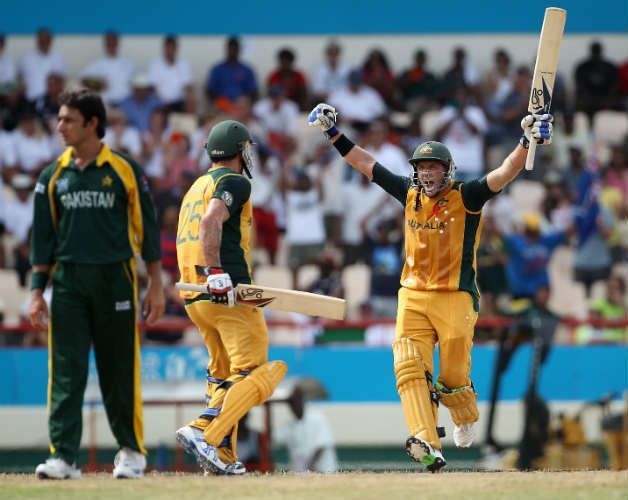 Michael Hussey roars after pulling off a stunning win in the semi-final
