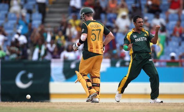 Rehman celebrates a wicket