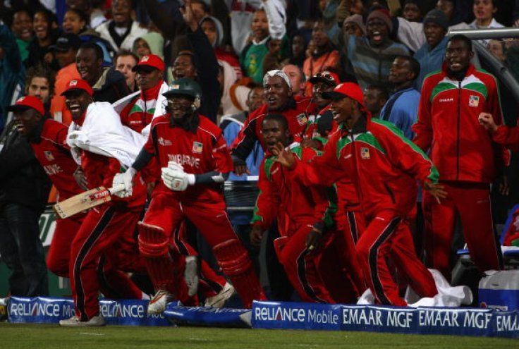 Zimbabwe players join their team-mates&Acirc;&nbsp;in celebrating their historic win against Australia