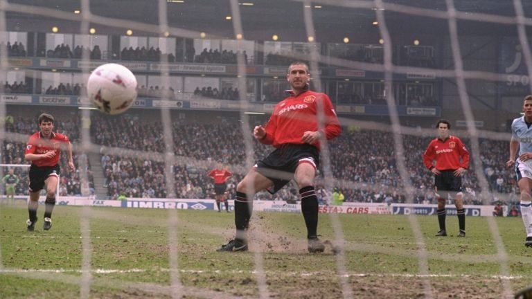 Eric Cantona slots home a penalty