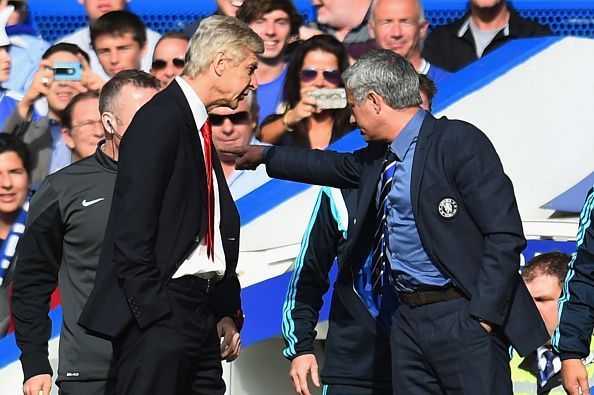 Moments before the infamous shoving match between Wenger and Mourinho.