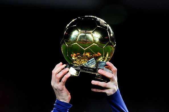Messi holding up the Ballon d&#039;Or