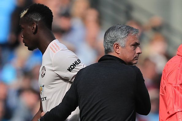 Paul Pogba with Jose Mourinho