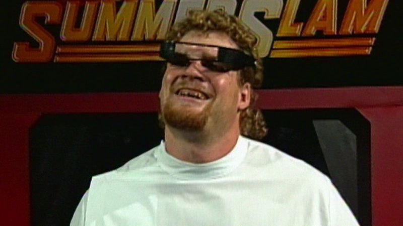 The maniacal dentist Isaac Yankem makes his entrance at Summerslam