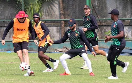 Sikandar Raza while playing football during the practice in Mirpur