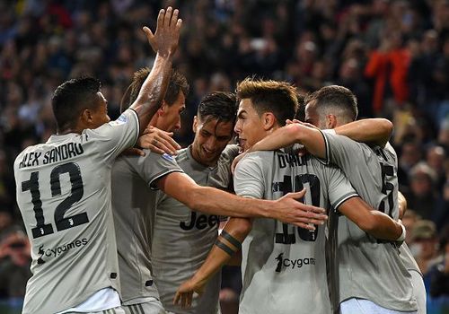 Juventus players celebrating after scoring against Udinese