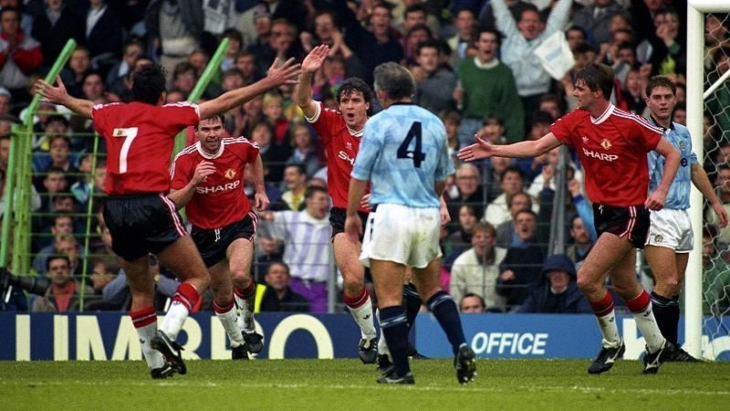 Mark Hughes celebrates Manchester United&#039;s first goal