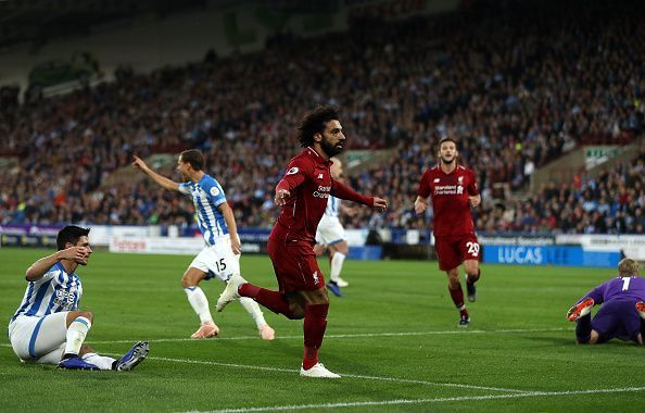 Salah wheels away to celebrate his finish