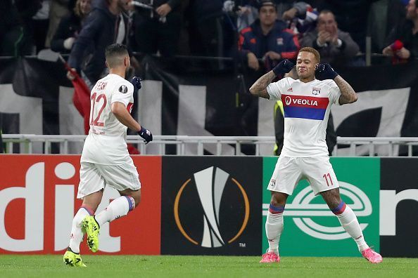 Nabil Fekir (left) alongside Memphis Depay