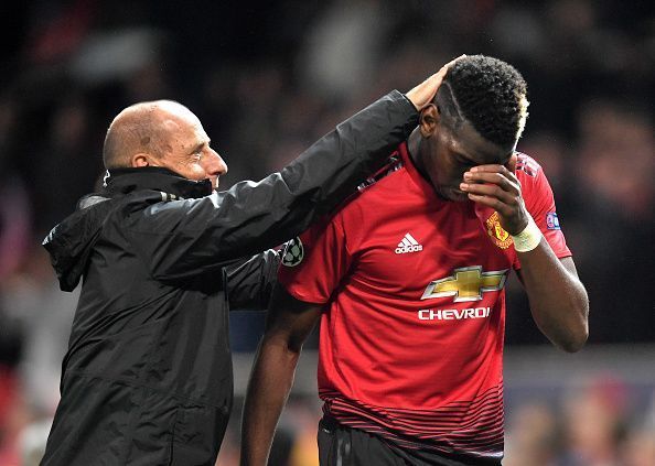 Paul Pogba is consoled after the game