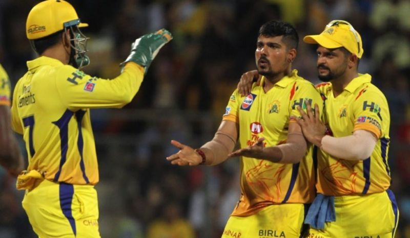 Karn Sharma with Dhoni and Raina