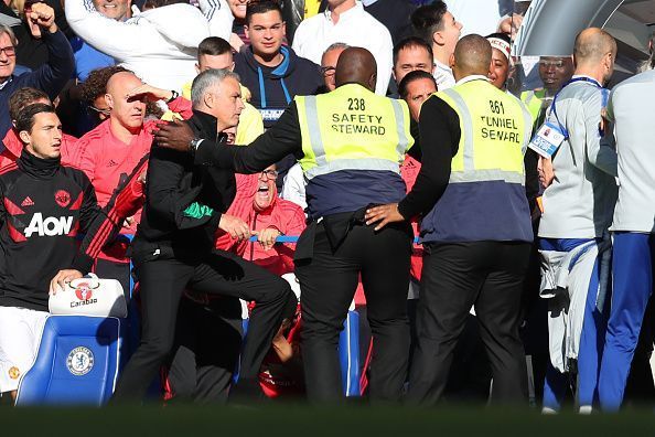 Mourinho leaps out of his seat to angrily confront Ianni