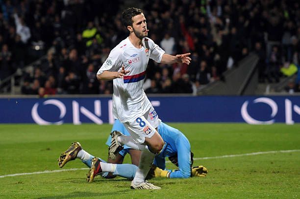 Miralem Pjanic celebrating a goal at former club Lyon