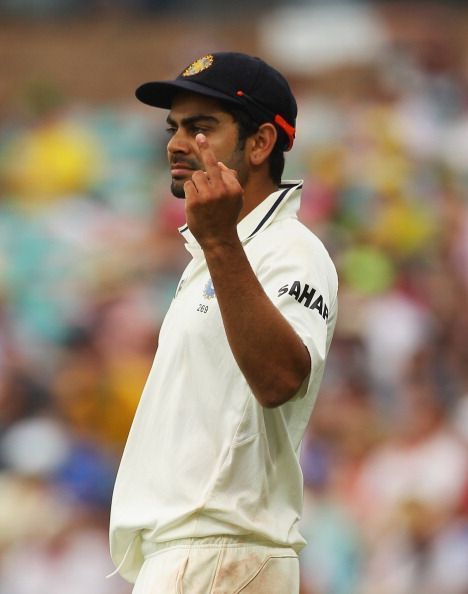 Showing his middle finger to the Australian crowd.
