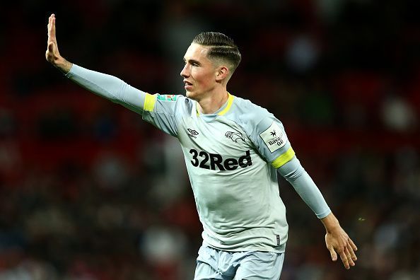 Harry Wilson teases the Red Devils fans with the iconic five times signal.