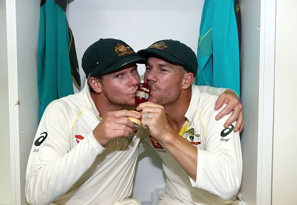Steve Smith and David Warner with the Ashes Urn