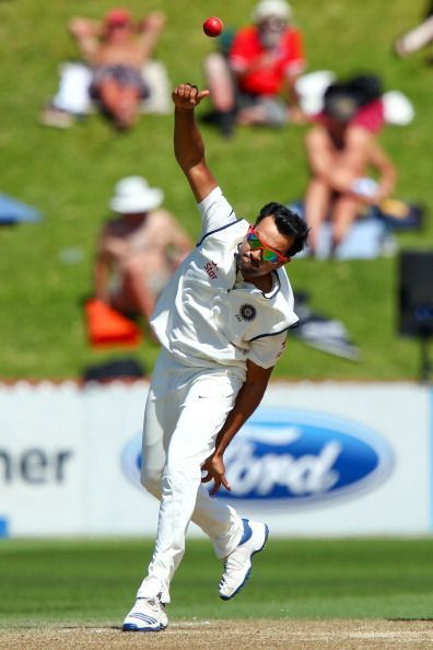 Rohit Sharma executing his bowling responsibilities.