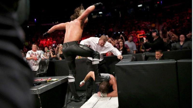 Rollins ramming Ambrose's head to the Cinderblocks!