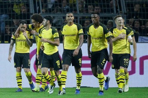 Jubilant Dortmund players after Alcacer's goal