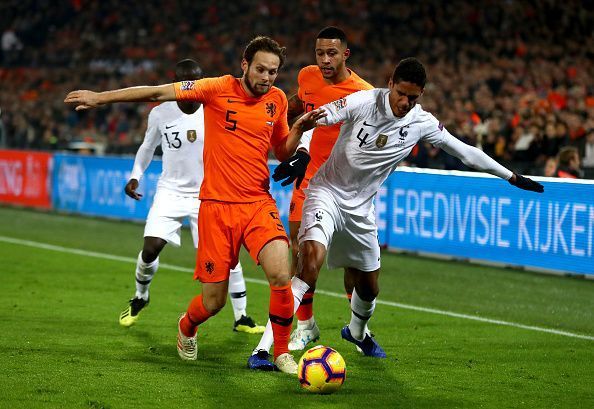 Varane (far right, no. 4) was France&#039;s best defender on a night to forget for the World Cup winners