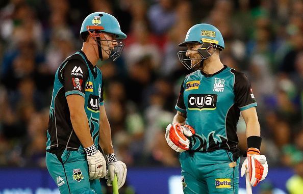 Chris Lynn (L) and Brendon McCullum (R)