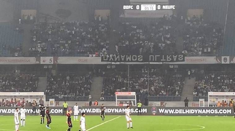 Dynamos Ultras displaying the poster upside down from the stands