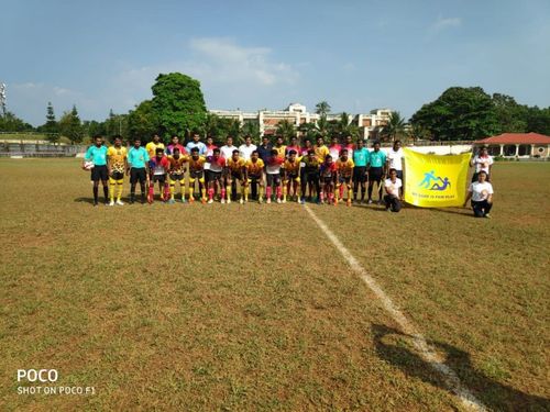 Teams posing for the picture along with officials ahead of the match.