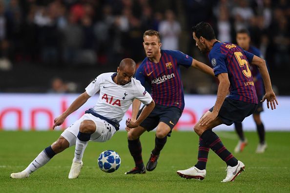 Arthur and Busquets double-marking Tottenham&#039;s Lucas Moura