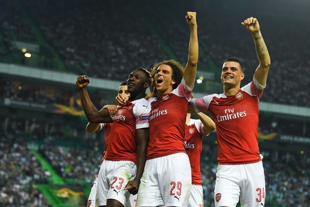 Danny Welbeck and co celebrate a late winner in Lisbon