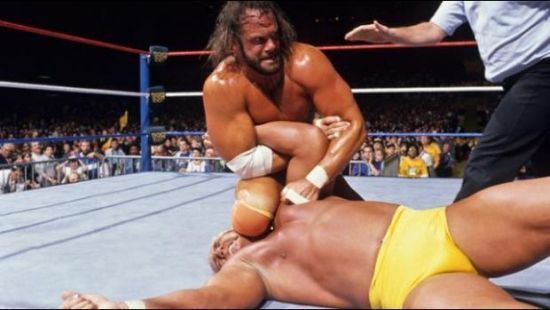 Macho Man Randy Savage has the Immortal Hulk Hogan at a disadvantage.