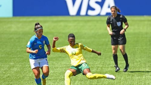 Brazil's Maria Eduarda in the blue jersey in action against Karabo Dhlamini of South Africa (Image Courtesy: FIFA)