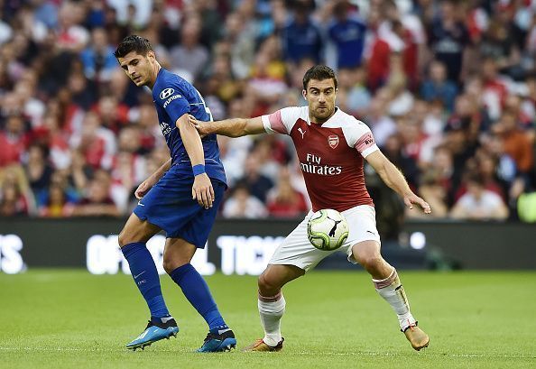 Sokratis Papastathopoulos and Alvaro Morata battle for the ball in Chelsea&#039;s 3-2 victory this season.